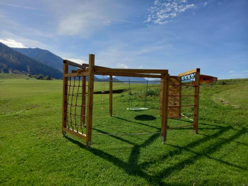 a goal in the middle of a field of grass at Apartmány Tatry Žiarce in Liptovský Mikuláš