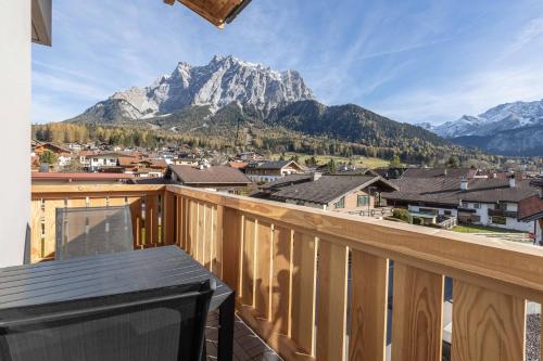 a balcony with a view of a mountain at Zugspitz Residence Ehrwald in Ehrwald