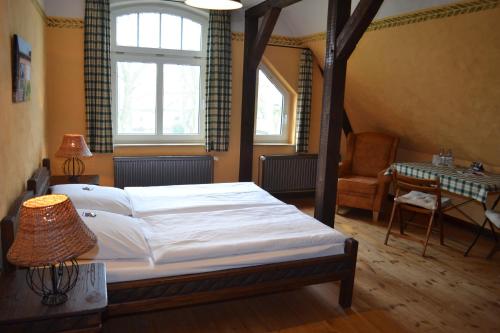 Postel nebo postele na pokoji v ubytování Vielanker Brauhaus GmbH