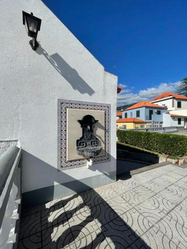 a picture of a skull on the side of a building at Valhalla Panorama in Funchal