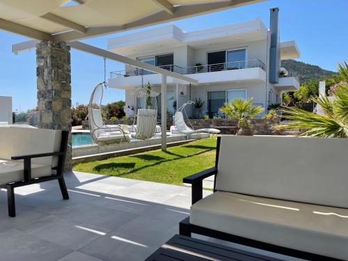 a view of a villa from the patio of a house at Villa Proistakis in Achlia