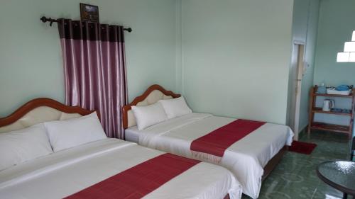 Postel nebo postele na pokoji v ubytování Khao Kho Flora