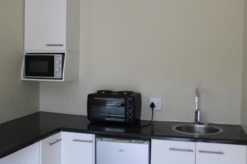 Kuchyň nebo kuchyňský kout v ubytování Framesby Guesthouse