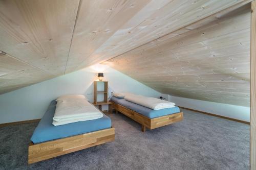 Postel nebo postele na pokoji v ubytování Pixnerhof Chalet Natyra
