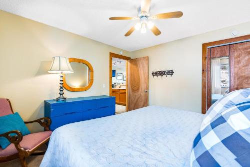a bedroom with a bed and a ceiling fan at 2 Bed 1 Bath Apartment in Wildernest, CO in Silverthorne