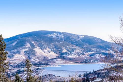 a view of a mountain with a body of water at 2 Bed 1 Bath Apartment in Wildernest, CO in Silverthorne