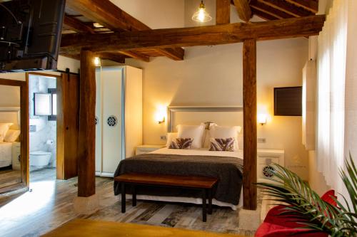 Ένα ή περισσότερα κρεβάτια σε δωμάτιο στο Apartamentos Caño las Parras