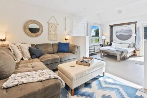 a living room with a couch and a table at Blue Mountain The Parker Slopeside in Blue Mountains