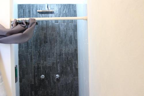 Et badeværelse på Habitacion 2 acceso independiente y autonomo Puebla