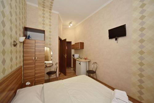 Cama o camas de una habitación en Malon Apartments
