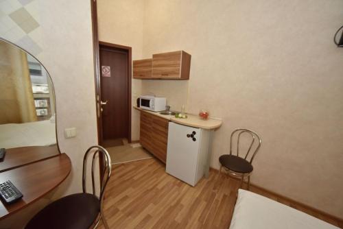 Una cocina o zona de cocina en Malon Apartments