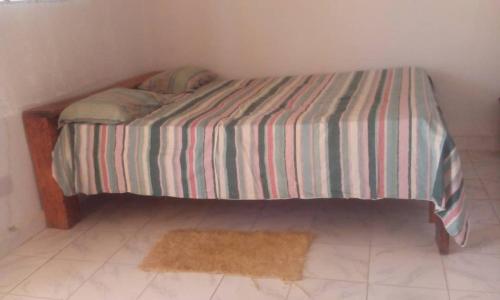 Ένα ή περισσότερα κρεβάτια σε δωμάτιο στο Camping Sitaba Lodge
