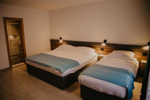 a bedroom with two beds in a room at Saray&App in Sarajevo