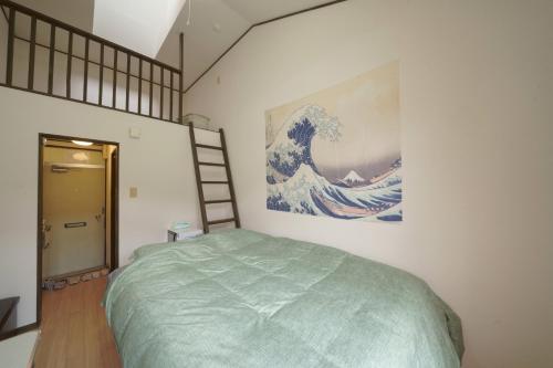 Säng eller sängar i ett rum på Garden House Ozasa - Vacation STAY 9178