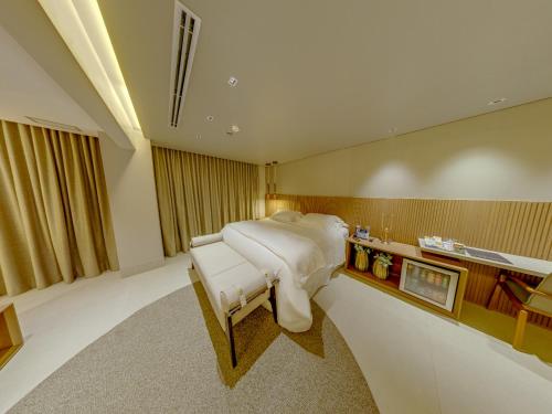Amazon Taiamã Hotelにあるベッド