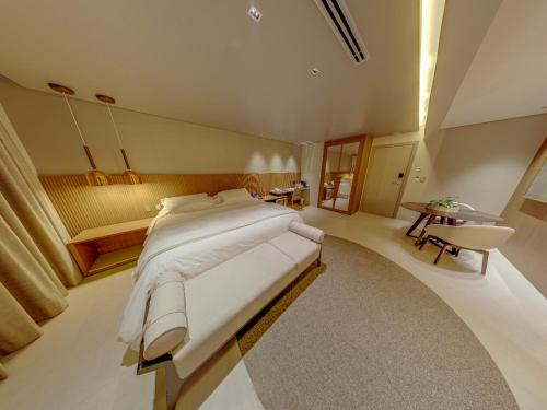 Amazon Taiamã Hotelにあるベッド