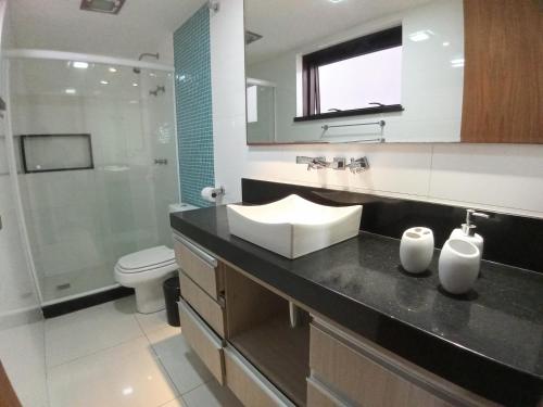 Bathroom sa Ipanema Rio Residence