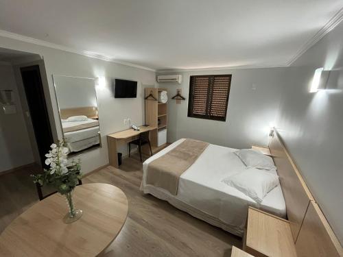 Katil atau katil-katil dalam bilik di Hotel Ijuí