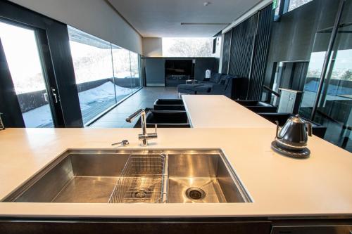 a kitchen with a sink and a counter top at Sapporo - House - Vacation STAY 13790 in Sapporo