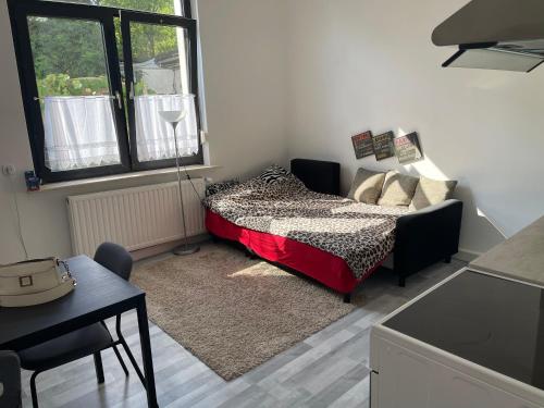 Un ou plusieurs lits dans un hébergement de l'établissement Ferienwohnung Zentral in Kassel