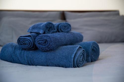 A bed or beds in a room at Ami House Roma