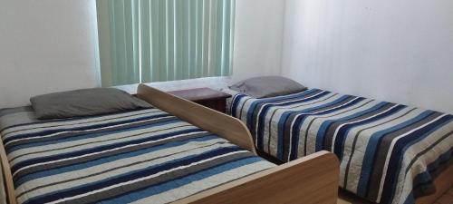Postel nebo postele na pokoji v ubytování Alcatraz House (Tecnológico de Monterrey College)