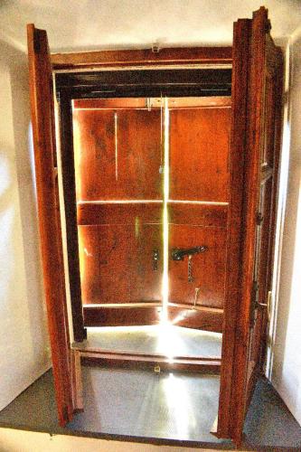 an open door with a window in a room at b&b CASCINA SORTINA Country House in Ozzano Monferrato