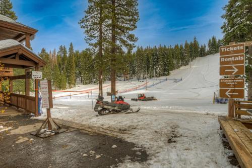 a snowmobile is parked next to a ski slope at Granlibakken Getaway - #72A in Tahoe City