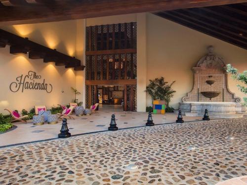 a ball court in a building with chessetts on the floor at The Hacienda at Krystal Grand Puerto Vallarta- All Inclusive in Puerto Vallarta