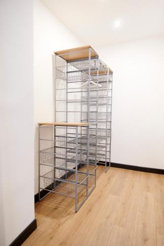 a shelf in an empty room next to a wall at Mazzini 1805 in Turin