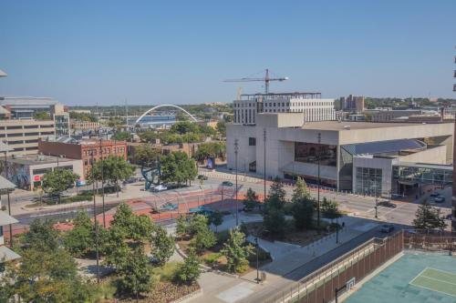 an aerial view of a city with buildings and trees at Designer Downtown Condo Suite - Splendid View in Des Moines