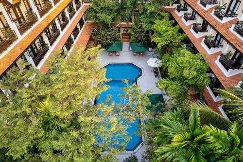 an overhead view of the pool at the resort at Saem Siemreap Hotel in Siem Reap
