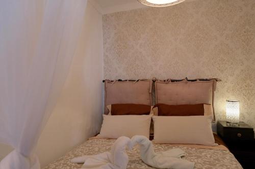 Cama o camas de una habitación en Beco das Canas Apartment