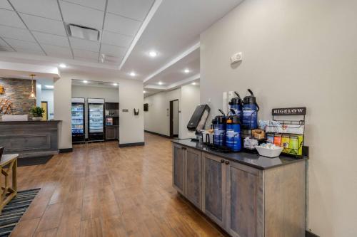 a lobby of a hospital with a pharmacyacistacistacist at Best Western Plus Rumford Falls in Rumford