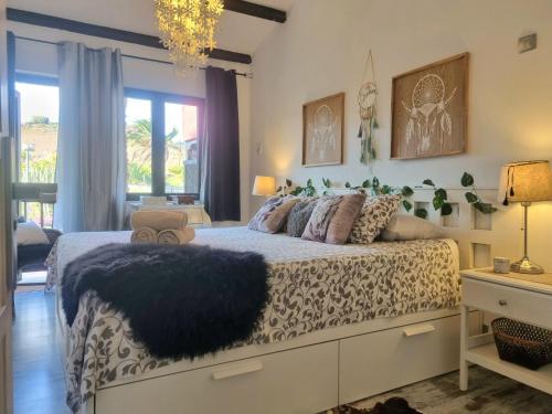 Giường trong phòng chung tại TOP 2 Sun Club bungalow terraza