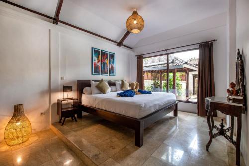 Un pat sau paturi într-o cameră la Villa Solluna