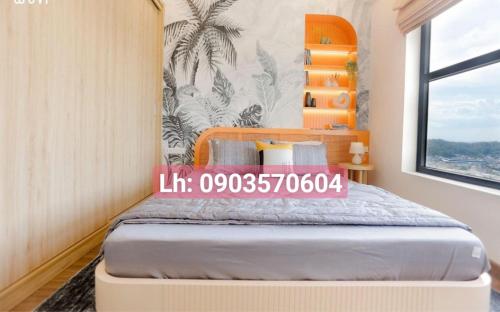 Postel nebo postele na pokoji v ubytování Quy Nhon Chillin' Apartment - FLC Sea Căn Hộ Hướng Biển Trung Tâm TP