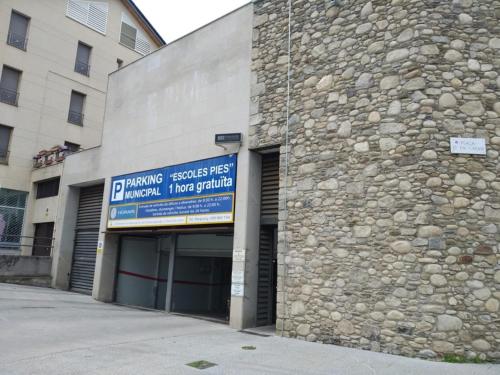 a building with a sign on the side of it at ELS 4 PICS in Puigcerdà