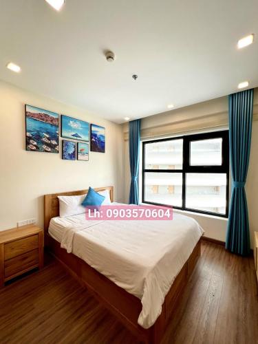 Postel nebo postele na pokoji v ubytování Quy Nhon Chillin' Apartment - FLC Sea Căn Hộ Hướng Biển Trung Tâm TP