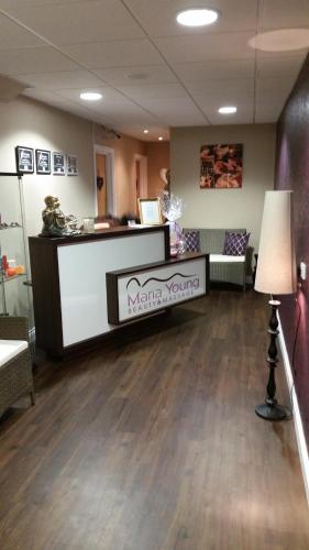 a waiting room with a counter in a pharmacy at Bells Hotel in Coleford