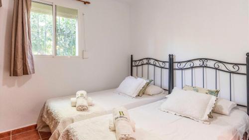 Posteľ alebo postele v izbe v ubytovaní Casa Luz Serena Cártama by Ruralidays