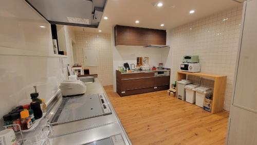 Cucina o angolo cottura di K's House Nikko - Kinugawa Onsen Hostel