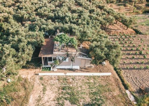 an aerial view of a house in a field at The Mills House in Kallithea