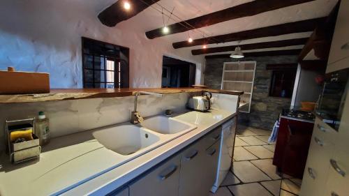 Køkken eller tekøkken på Maison de montagne face aux Arcs