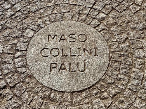 a stone circle with the words maso columbinian palu at Monolocale in chalet alpino 022143-AT-010681 in Madonna di Campiglio