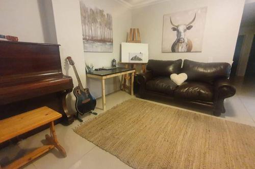 Χώρος καθιστικού στο Dolphin Africa Apartment