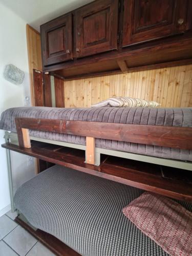 a pair of bunk beds in a room at Boost Your Immo Le Gaubert Vars 805 in Vars