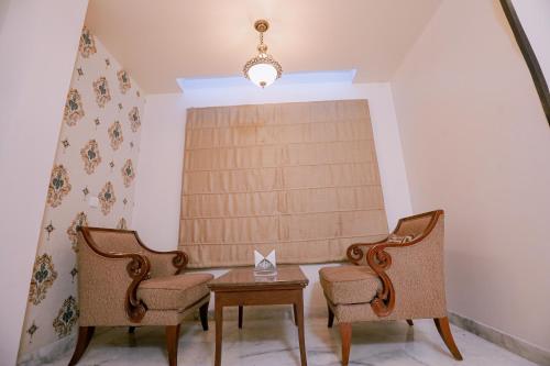 Posezení v ubytování Hotel Leela Grande