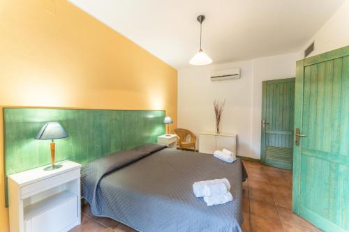 Katil atau katil-katil dalam bilik di Residence I Mirti Bianchi