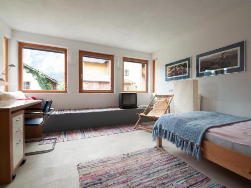 A bed or beds in a room at Loft am See